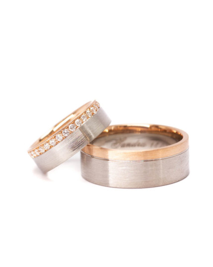 Trauringpaar  Platin und Rotgold mit Brillantreihe im Handverschnitt
