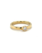 Ring mit Brillanten in Rundistenfassung 3mm Ø aus 14 Karat Gelbgold
